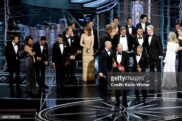 Prior to learning of a presentation error, 'La La Land' producers Jordan Horowitz , Fred Berger and Marc Platt accept the Best Picture award for 'La...