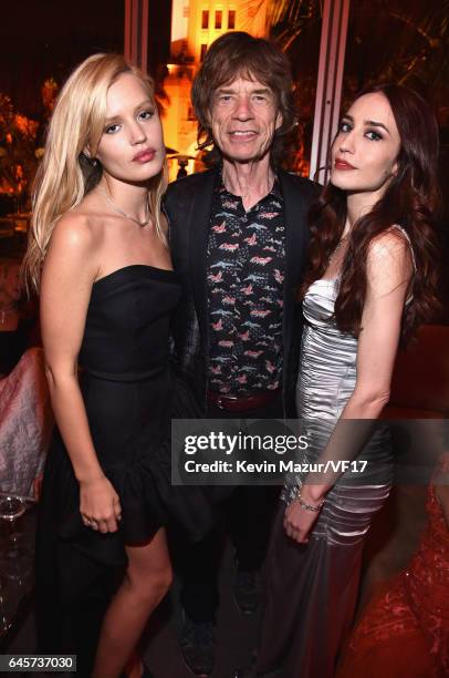 Musician Mick Jagger with models Georgia May Jagger and Elizabeth Jagger attend the 2017 Vanity Fair Oscar Party hosted by Graydon Carter at Wallis...