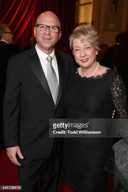 Head of movie distribution and marketing at Amazon Studios Bob Berney and Jeanne Berney of Picturehouse attend the 89th Annual Academy Awards at...