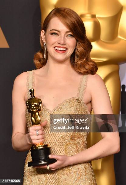 Actor Emma Stone, winner of Best Actress for 'La La Land,' poses in the press room during the 89th Annual Academy Awards at Hollywood & Highland...