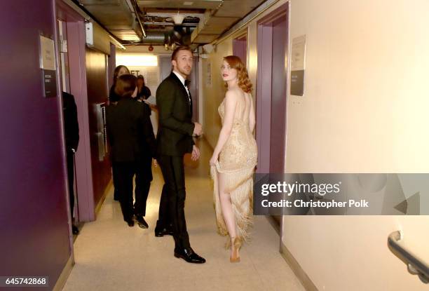 Actors Ryan Gosling and Emma Stone pose backstage during the 89th Annual Academy Awards at Hollywood & Highland Center on February 26, 2017 in...