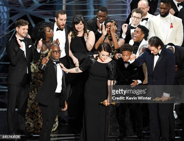 Producer Adele Romanski , writer/director Barry Jenkins, producer Jeremy Kleiner and cast/crew members accept Best Picture for 'Moonlight' onstage...