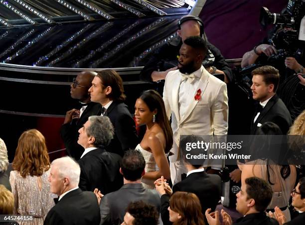 Writer/director Barry Jenkins, producer Jeremy Kleiner, actress Naomie Harris, writer Tarell Alvin McCraney look on from the audience as 'Moonlight'...