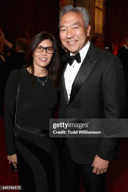 Chairman and CEO of Warner Bros. Entertainment Kevin Tsujihara and Sandy Tsujihara attends the 89th Annual Academy Awards at Hollywood & Highland...