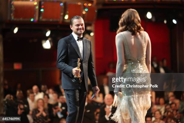 Actor Leonardo DiCaprio and actress Emma Stone, winner of Best Actress for 'La La Land' onstage during the 89th Annual Academy Awards at Hollywood &...