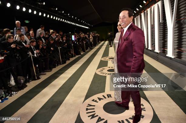 Frances Glandney and recording artist Smokey Robinson attend the 2017 Vanity Fair Oscar Party hosted by Graydon Carter at Wallis Annenberg Center for...