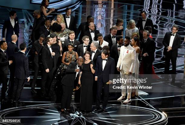 Writer/director Barry Jenkins, producers Adele Romanski and Jeremy Kleiner and cast/crew members accept Best Picture for 'Moonlight' onstage during...