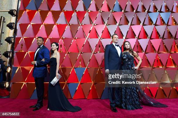 Actor Terrence Howard, Mira Pak, actor Vince Vaughn and Kyla Weber attend the 89th Annual Academy Awards at Hollywood & Highland Center on February...