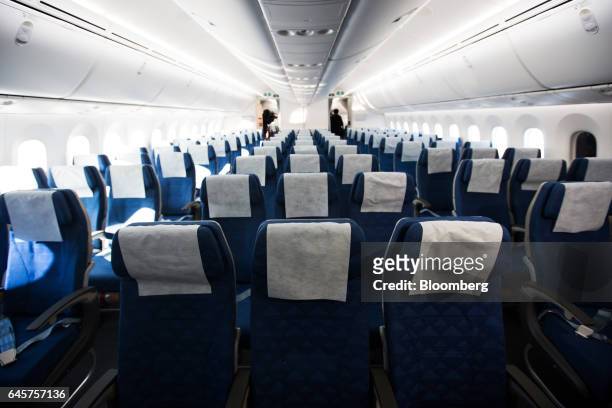Seats stand in the economy class cabin of a Boeing Co. 787-9 Dreamliner passenger aircraft operated by Korean Air Lines Co. During a media preview at...
