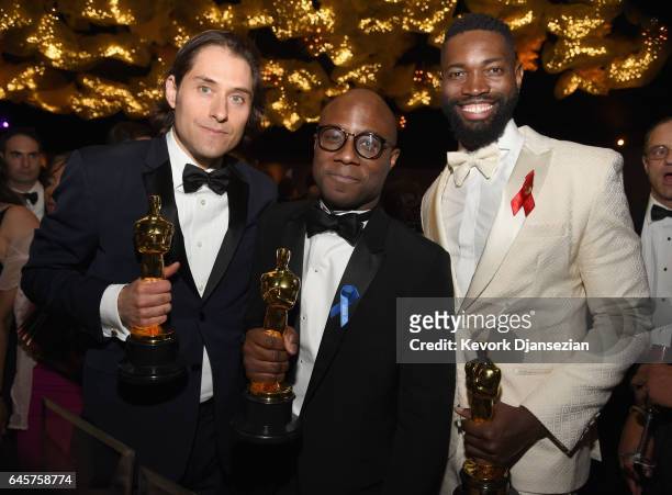 Producer Jeremy Kleiner, director Barry Jenkins and screenwriter Tarell Alvin McCraney attend the 89th Annual Academy Awards Governors Ball at...