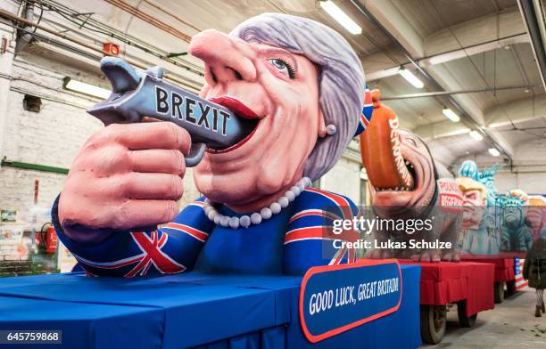 Float featuring British Premier Theresa May prior to the annual Rose Monday parade on February 27, 2017 in Dusseldorf, Germany. Political satire is a...