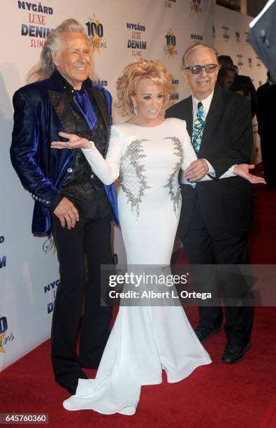 Entrepreneur Peter Nygard, Country singer Tanya Tucker and host Norby Walters arrive for the Norby Walters' 27th Annual Night Of 100 Stars Black Tie...
