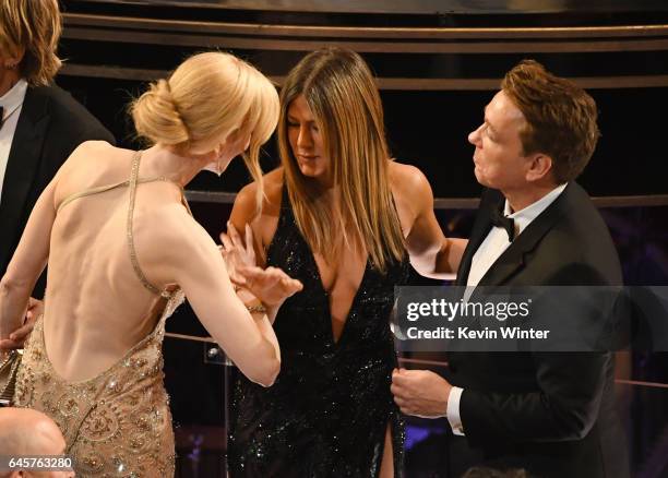 Actors Nicole Kidman, Jennifer Aniston and Justin Theroux speak during the 89th Annual Academy Awards at Hollywood & Highland Center on February 26,...