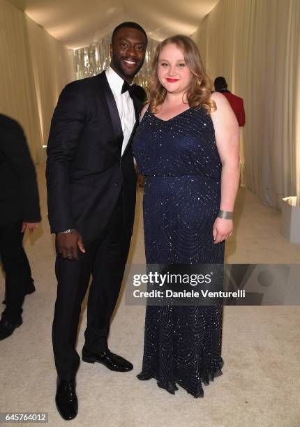 Actors Aldis Hodge and Danielle Macdonald attends Bulgari at the 25th Annual Elton John AIDS Foundation's Academy Awards Viewing Party at on February...