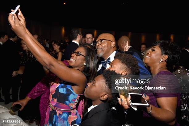 Actor Samuel L. Jackson takes a selfie with Jaden Piner, Alex R. Hibbert and guests during the 89th Annual Academy Awards Governors Ball at Hollywood...