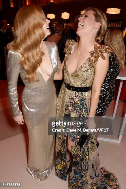 Actors Amy Adams and Elizabeth Banks attend the 2017 Vanity Fair Oscar Party hosted by Graydon Carter at Wallis Annenberg Center for the Performing...