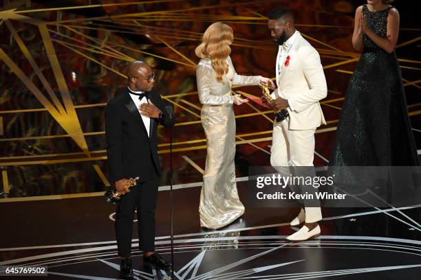 Writer/director Barry Jenkins and writer Tarell Alvin McCraney accept Best Adapted Screenplay for 'Moonlight' onstage during the 89th Annual Academy...