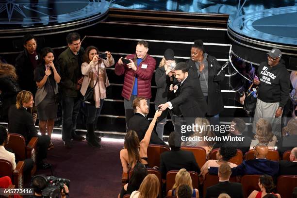 Host Jimmy Kimmel surprises tourists during the 89th Annual Academy Awards at Hollywood & Highland Center on February 26, 2017 in Hollywood,...