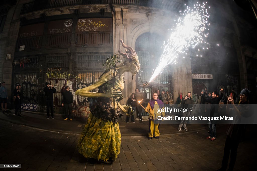 A Dragon toy breathes fire during the traditional festival of 'Correfoc' in Barcelona, Spain