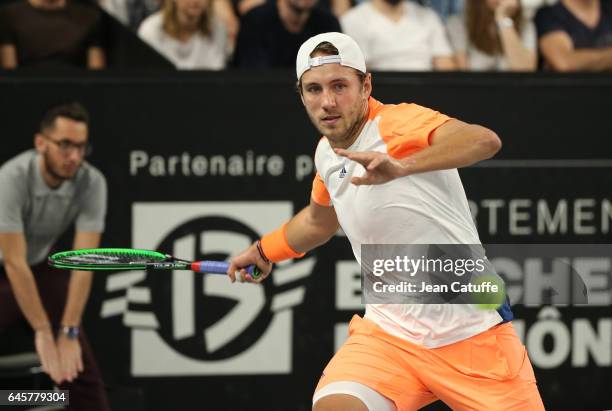 Lucas Pouille of France in action during the final of the Open 13, an ATP 250 tennis tournament at Palais des Sports on February 26, 2017 in...