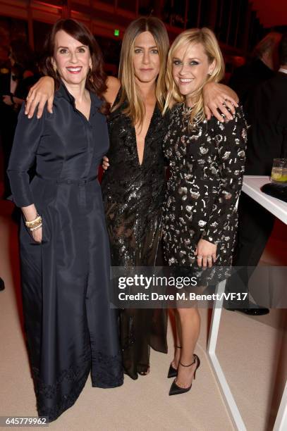 Actors Megan Mullally, Jennifer Aniston, and Reese Witherspoon attend the 2017 Vanity Fair Oscar Party hosted by Graydon Carter at Wallis Annenberg...