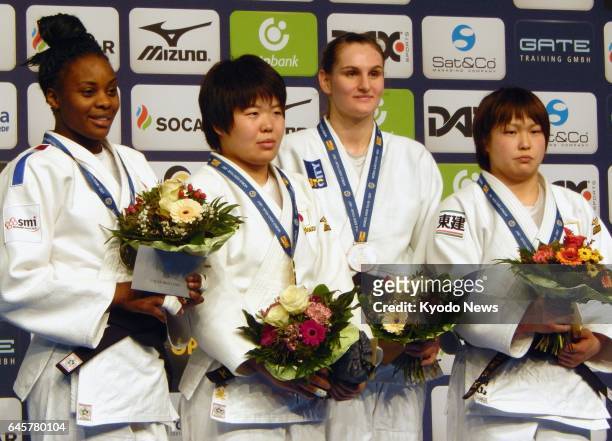 Gold medalist Mami Umeki of Japan , silver medalist Madeleine Malonga of France , and bronze medalists Klara Apotekar of Slovenia and Rika Takayama...