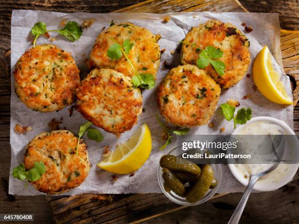 crispy golden fish cakes - potato pancake stock pictures, royalty-free photos & images