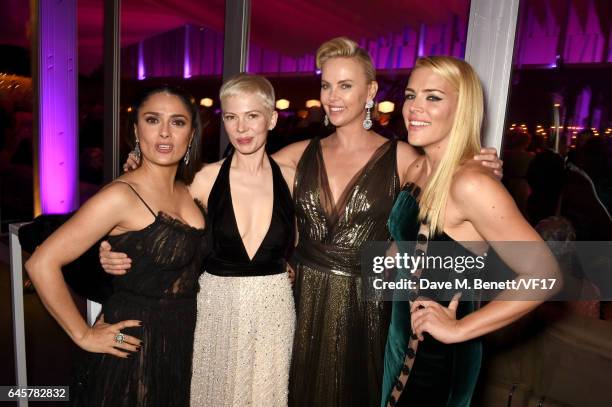 Actors Salma Hayek, Michelle Williams, Charlize Theron and Busy Philipps attend the 2017 Vanity Fair Oscar Party hosted by Graydon Carter at Wallis...