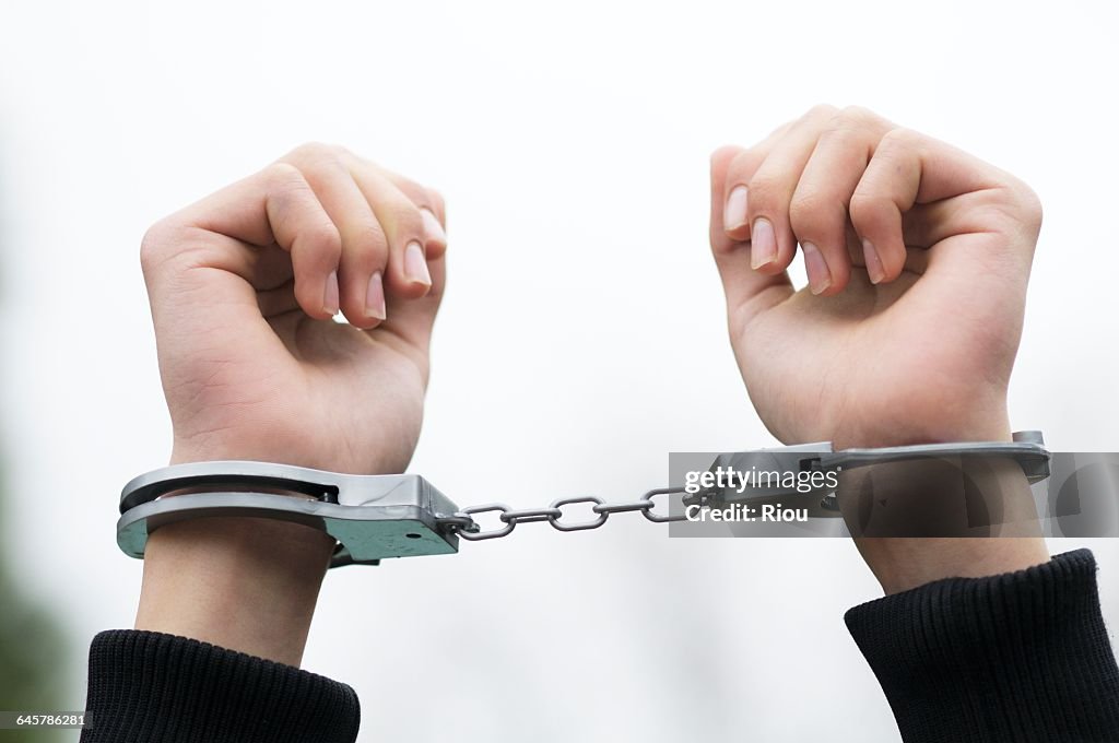 Boy with handcuffs
