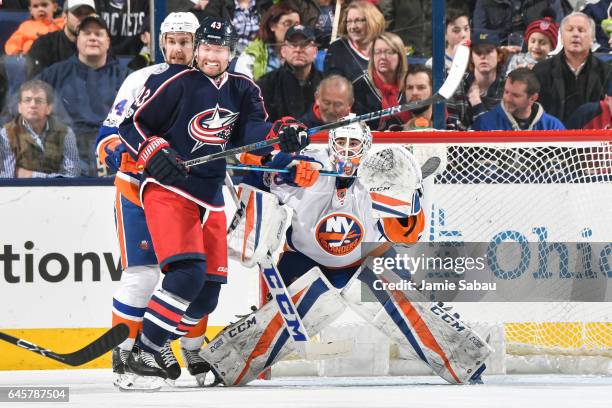 Scott Hartnell of the Columbus Blue Jackets skates in front of goaltender Jean-Francois Berube of the New York Islanders on February 25, 2017 at...
