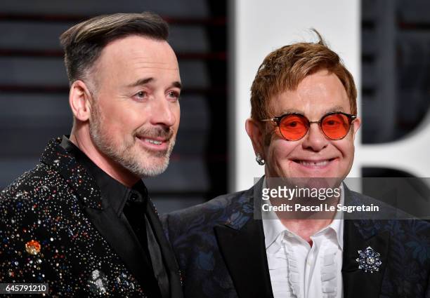 Director-producer David Furnish and recording artist Elton John attend the 2017 Vanity Fair Oscar Party hosted by Graydon Carter at Wallis Annenberg...