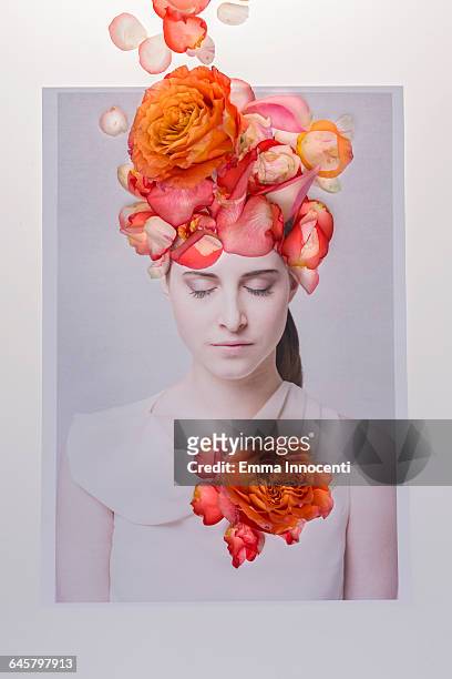 young woman surrounded by flowers - cabeça da flor imagens e fotografias de stock