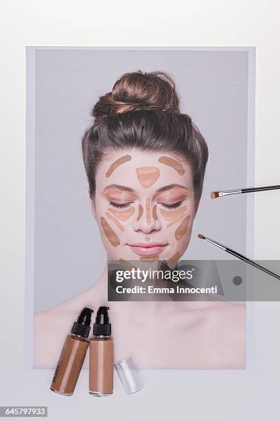 contouring make up on young woman - foundation make up stock-fotos und bilder