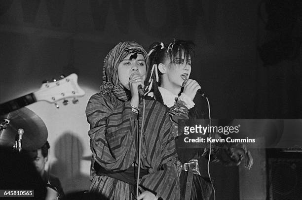 Singers Annabella Lwin and Boy George performing with English new wave group Bow Wow Wow, Manchester University, 14th March 1981. George performed...