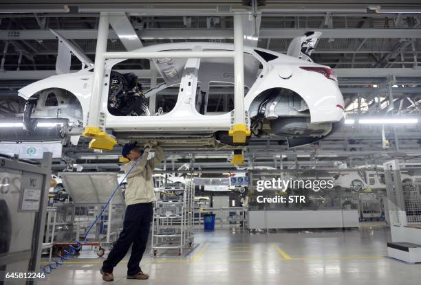 This photo taken on February 21, 2017 shows a worker in a Hyundai factory in Cangzhou, in China's northern Hebei province. The factory is the South...