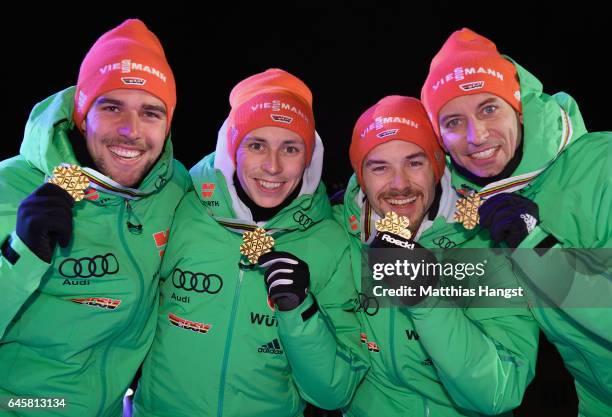 Bjoern Kircheisen, Eric Frenzel, Fabian Riessle and Johannes Rydzek of Germany pose with their medals during the award ceremony after winning the...