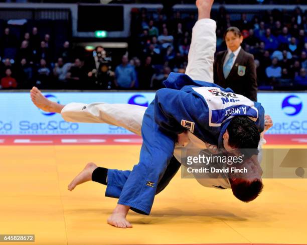Aaron Wolf of Japan throws Benjamin Fletcher of Great Britain for an ippon to reach the u100kg final during the 2017 Dusseldorf Grand Prix at the...