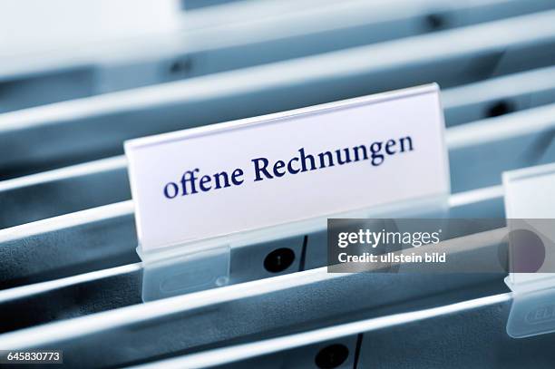 Reiter auf einem Hängeordner mit der Aufschrift offene Rechnungen