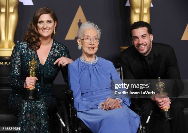 Producer Caroline Waterlow and director/producer Ezra Edelman , winners of the award for Documentary for 'O.J.: Made in America,' pose with physicist...