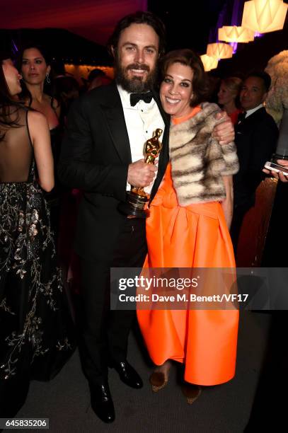 Actor Casey Affleck and Peggy Siegal attend the 2017 Vanity Fair Oscar Party hosted by Graydon Carter at Wallis Annenberg Center for the Performing...