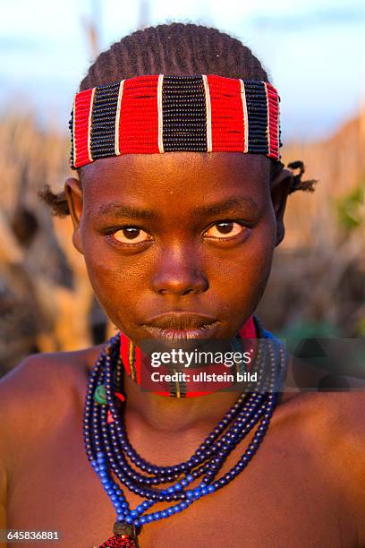 Turmi, Maedchen, Aethiopien, Omo Valley, Hamar Maedchen, Turmi Ethiopia Africa village Lower Omo Valley Hamar Hammer tribe young girl in village at...