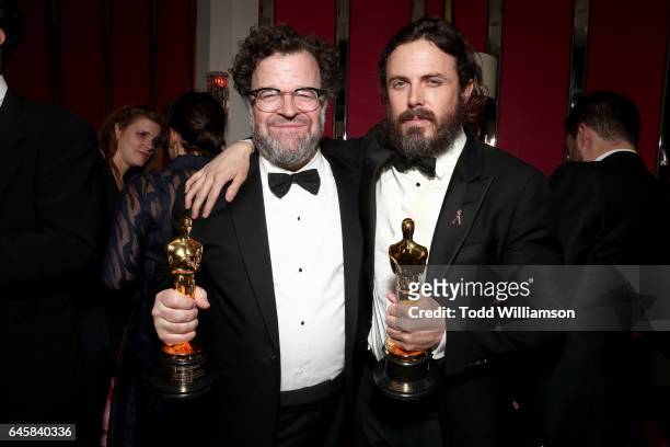 Director Kenneth Lonergan and actor Casey Affleck with their awards for 'Manchester By The Sea' attend the Amazon Studios Oscar Celebration at...