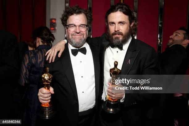 Director Kenneth Lonergan and actor Casey Affleck with their awards for 'Manchester By The Sea' attend the Amazon Studios Oscar Celebration at...