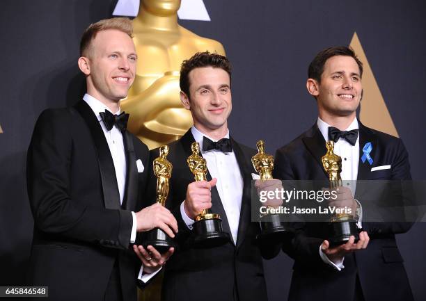 Songwriters Justin Paul, Justin Hurwitz and Benj Pasek, winners of the Best Original Song award for 'City of Stars' pose in the press room at the...