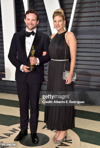 Visual effects artist Dan Lemmon and guest attend the 2017 Vanity Fair Oscar Party hosted by Graydon Carter at Wallis Annenberg Center for the...