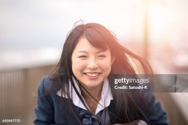 vélo fille high school - orient photos et images de collection