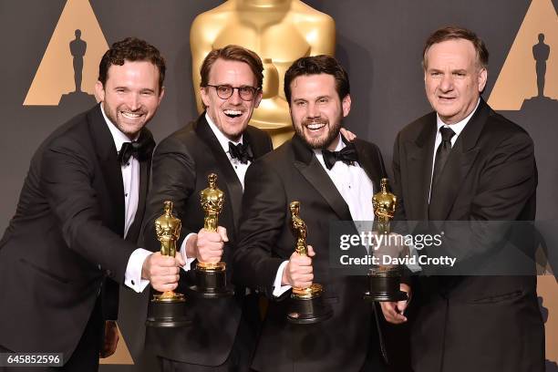 Dan Lemmon, Andrew R. Jones, Adam Valdez and Robert Legato attend the 89th Annual Academy Awards - Press Room at Hollywood & Highland Center on...