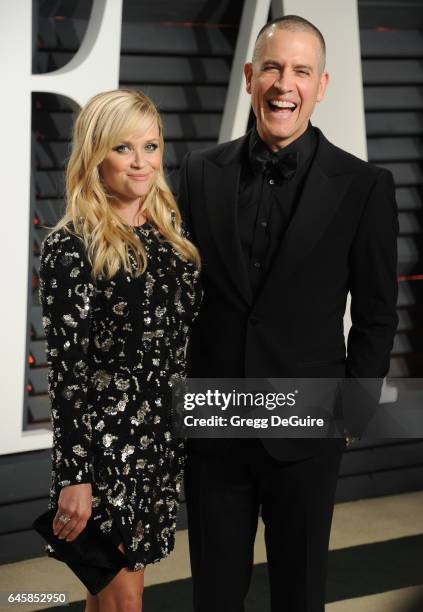 Actress Reese Witherspoon and husband Jim Toth arrive at the 2017 Vanity Fair Oscar Party Hosted By Graydon Carter at Wallis Annenberg Center for the...