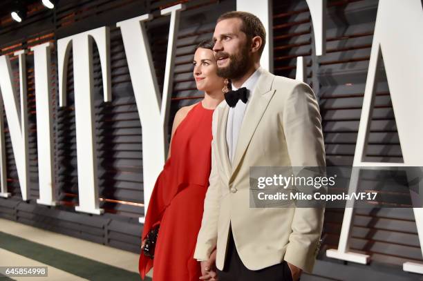 Actors Amelia Warner and Jamie Dornan attend the 2017 Vanity Fair Oscar Party hosted by Graydon Carter at Wallis Annenberg Center for the Performing...