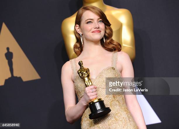 Actress Emma Stone poses in the press room at the 89th annual Academy Awards at Hollywood & Highland Center on February 26, 2017 in Hollywood,...